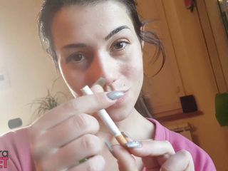 Smokin Fetish: Tempting Italian girl smokes a cigar in a close up...