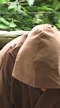 Hooded Mature Man Endures Clamps and Heavy Chains
