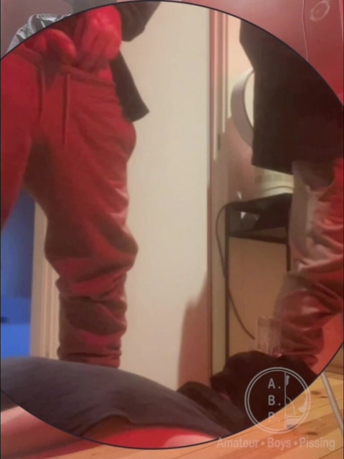 AmateurBoysPissing: Amateur Boy Pissing in a Glass Held in His Friend's...