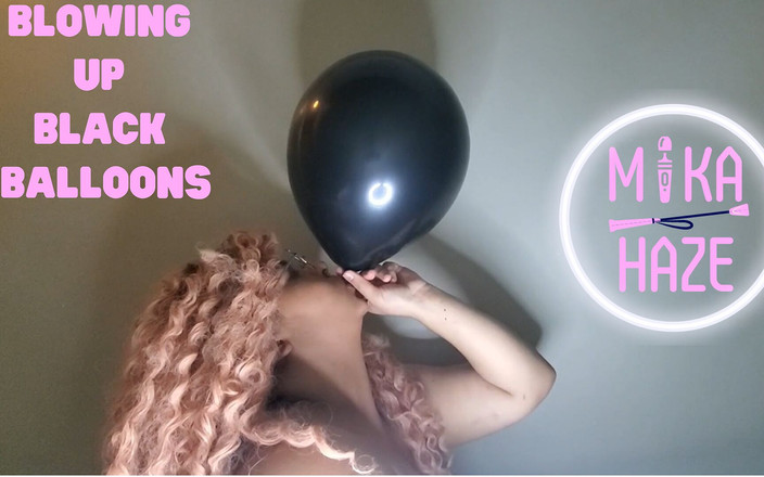 Mika Haze: Blowing up black balloons