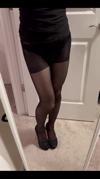 Looking Self in the Mirror in the Poka Dots Black Pantyhose.