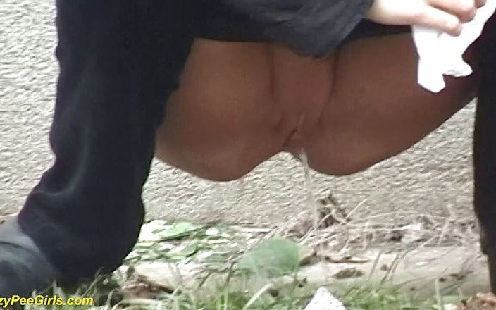 Crazy pee girls: Crazy girl peeing in outdoor