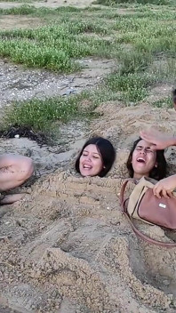 Buried by the Beach Bitches!