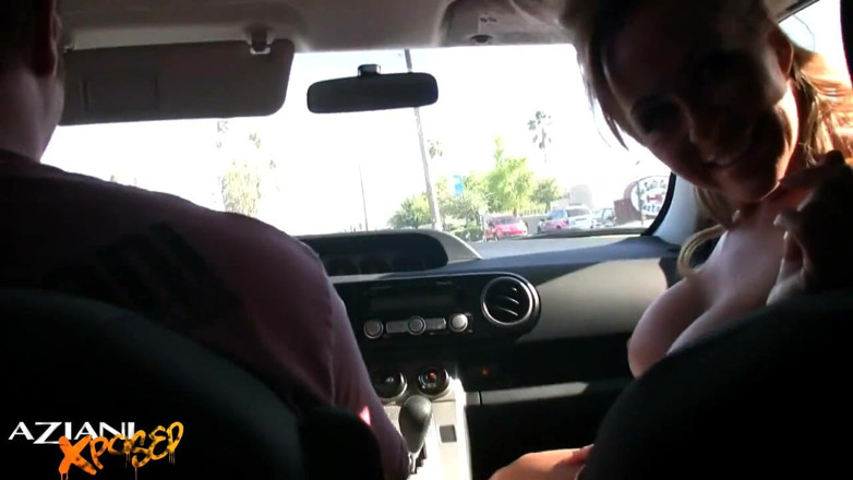 Aziani: Busty Blonde MILF Flashes Perfect Tits in Car Ride
