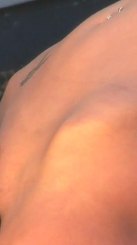 Straight nipples coming out of the net touches you on a parked motorcycle
