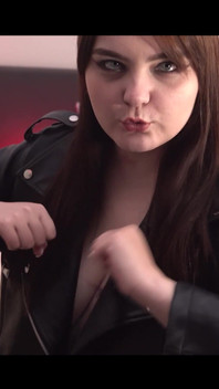 Pretty Woman in a Leather Jacket Dancing Before Sex