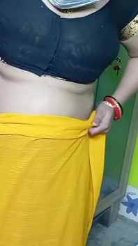 Indian Beautiful Bhabhi in Yellow Color Sari.