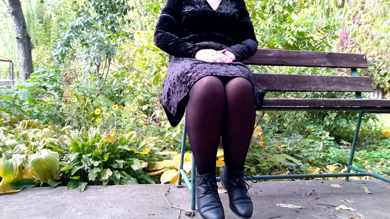 Elena: Peeing with legs spread wide on a bench in an...