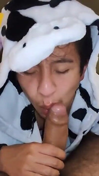In a cow pijama sucking and riding my big uncut cock until he earns my hot milk