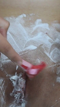 Shaving a Hairy Pussy with a New Razor Close-up!