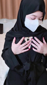 A Naughty Malaysian Hijabi Girl Doing Porn Showing off Her Ass in Abaya