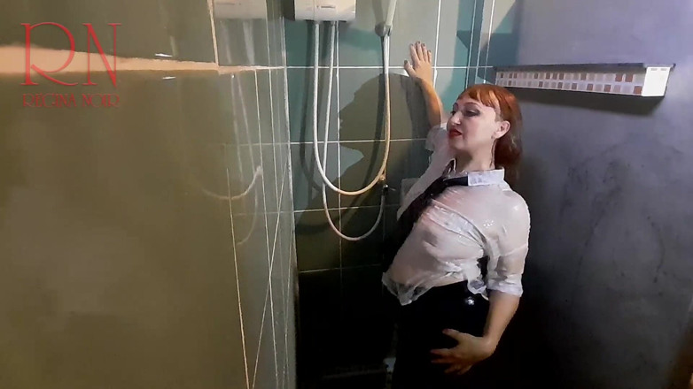 Regina Noir: A chick in clothes under the shower. Wet panties, wet...