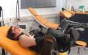 Rubber &amp; Clinic Studio - 1ATOYS: Masturbation in rubber on the gyntable