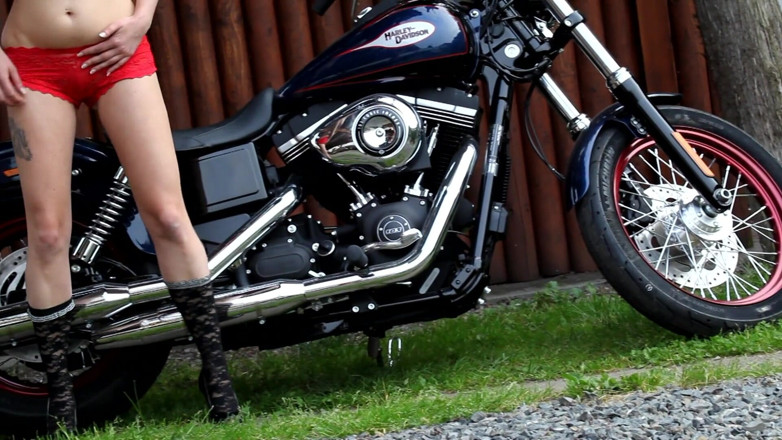 Public Entertainment: Tattooed stepmom on the bike