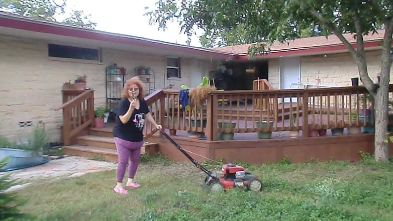 BBW nurse Vicki adventures with friends: Nurse Vicki Mowing Grass dressed then topless