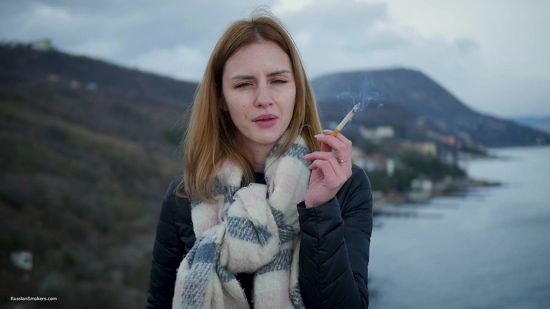Russian Smokers: Coastal Smoke Moment Quiet Breeze Scenic View