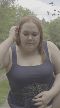 Redhead BBW Pisses Next to a Gate