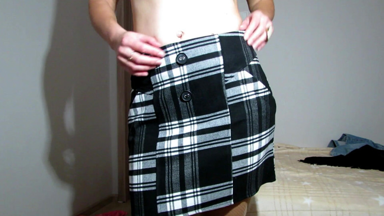Sweet beauty: Sweet beauty trying on skirts
