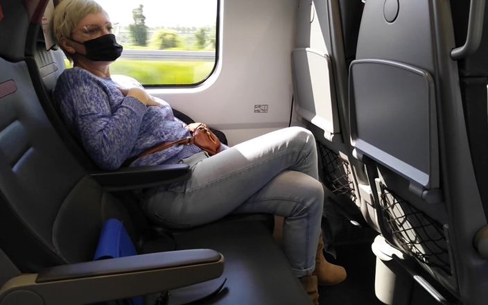 Mature cunt: Public train crossed legs orgasm
