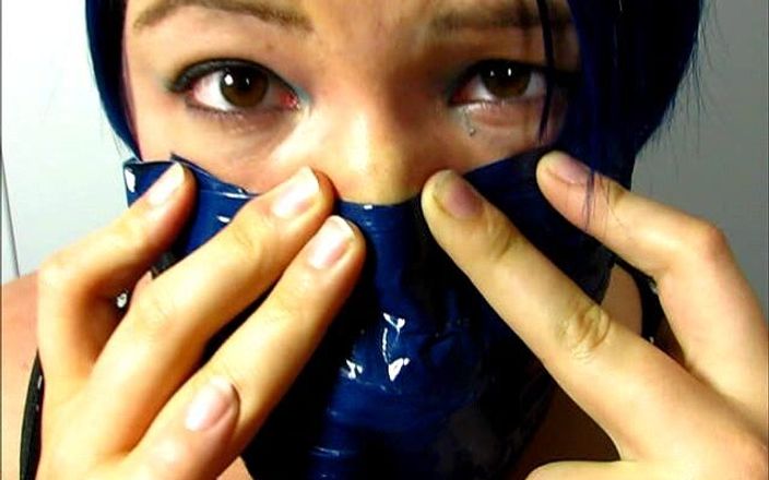 Selfgags classic: Layla makes herself another cruel, tight, and massive gag with 18...