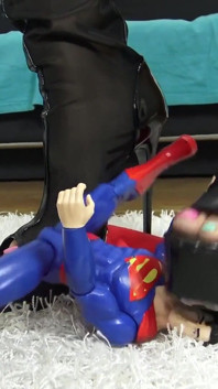 Superman Crush! Cruel Reell Crushes Superman Symbolically for All Men!