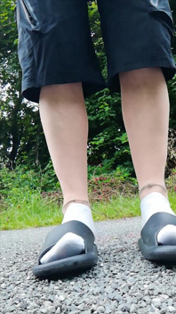 In Slippers and White Socks in Nature