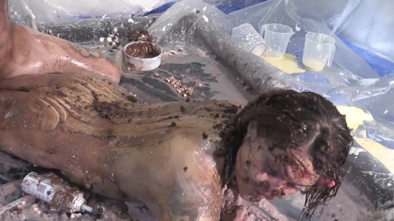Gunked up girls: Chloe dominates Tallulah in cake