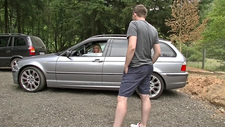 CamProMedia: German blond Lara risky blowjob on a parking with stranger