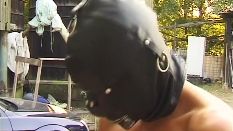 Bangora MILFs: Tattooed Brunette MILF Cuffed for Boot Domination