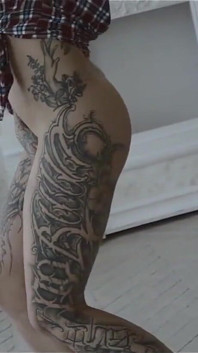 Plumpy tattooed MILF is dancing striptease