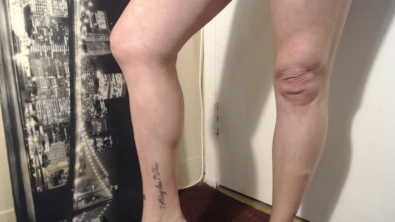 Abby Anna: Oiled calves flexing calve muscle
