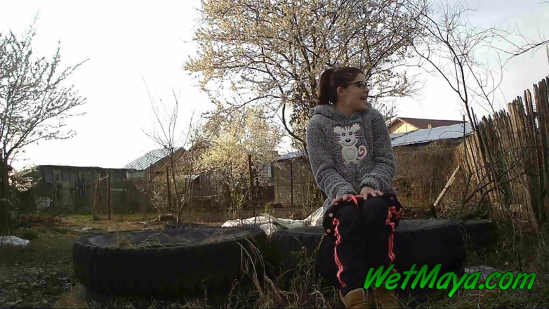 Wet Maya: Peeing on some old tires in the yard