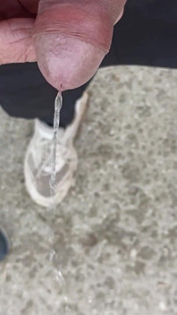 Friend Is Holding My Cock While Im Peeing on the Ground Outdoor