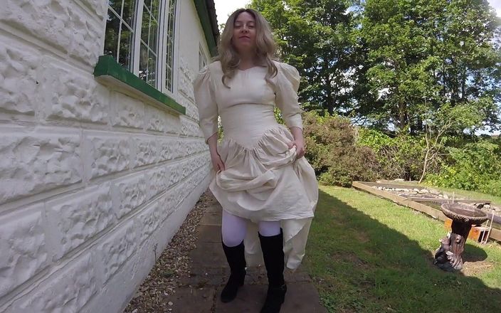 Horny vixen: Wedding Dress, Boots and Stockings Outdoors