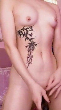 Naked Girl Plays with a Vibrator on Camera