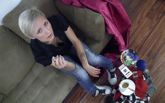 Smoke it bitch: Sweet blonde loves smoking cigarettes on the couch