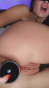 Skinny girl subjected her ass to a hard stretch