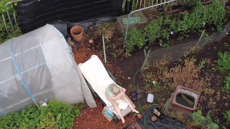 British Cougar: Voyeur with Drone Watches Me in the Garden Playing with...