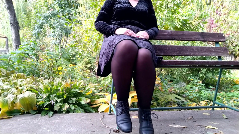 Elena: Peeing with legs spread wide on a bench in an...
