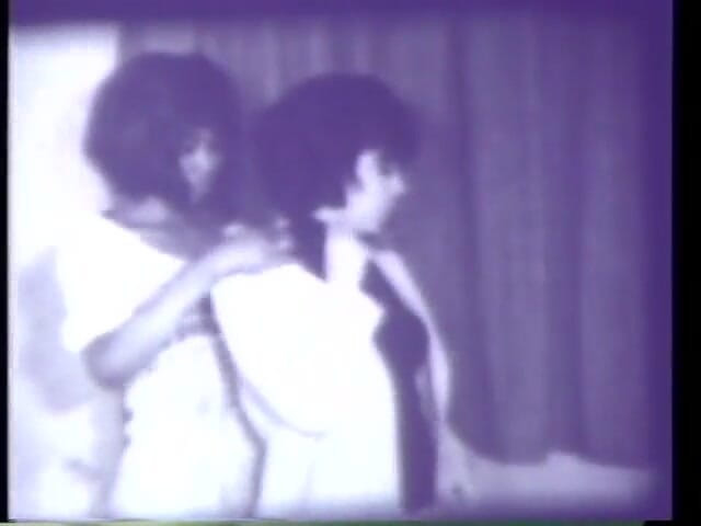 Vintage Usa: Vintage 3some with horny black &amp; white milf and strapon dildo (No audio...