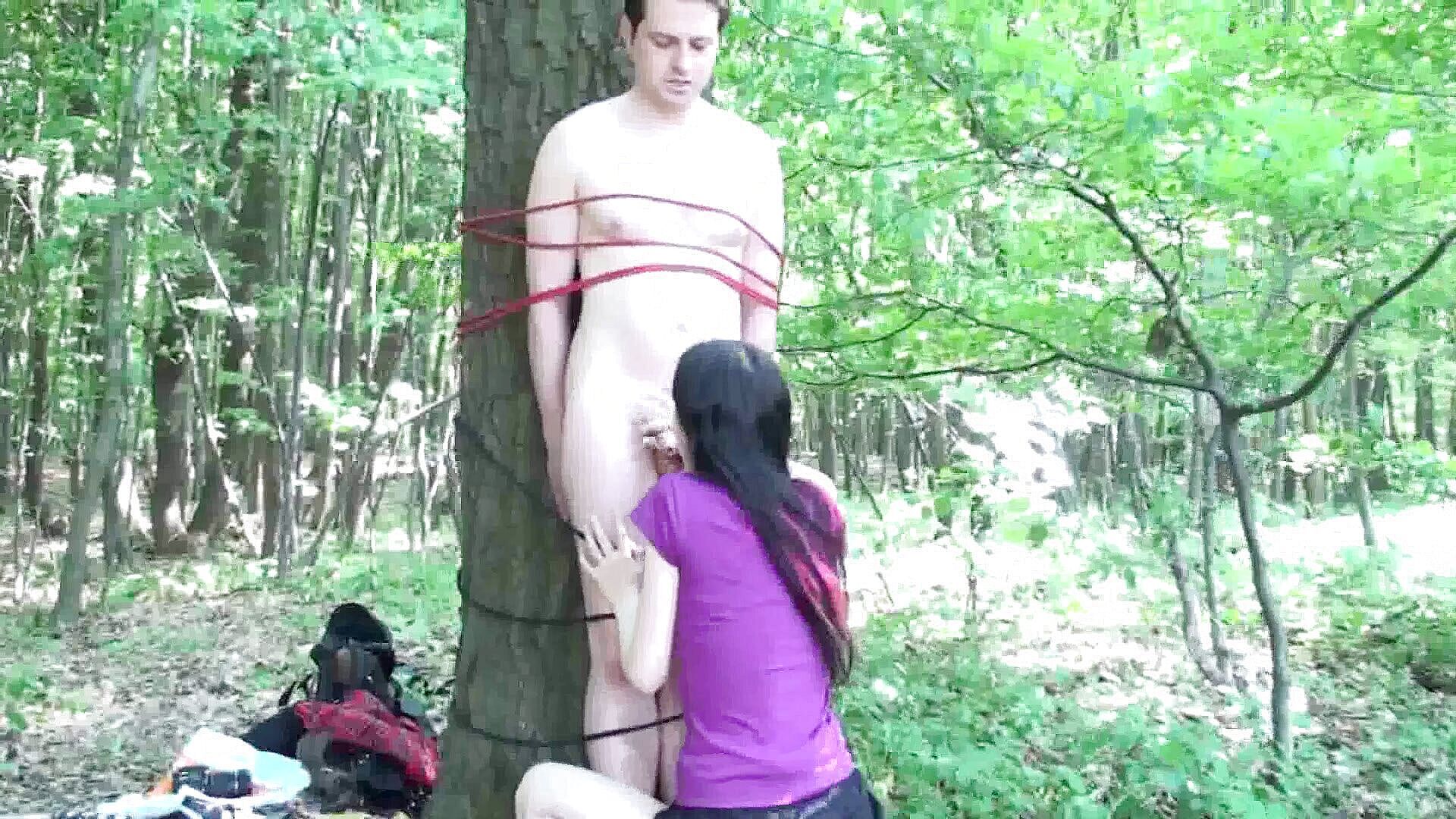 Cock to blow, tied to the tree--Femdom Sex