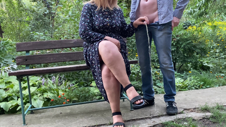 OurFetishLife: SHE holds his cock while HE pee in the park