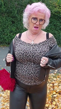 Naughty Granny Tongue Out Flashing Big Tits in Public