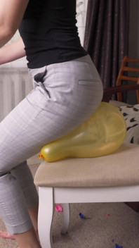 Sexy Girl Pops Balloons in Ripped Pants