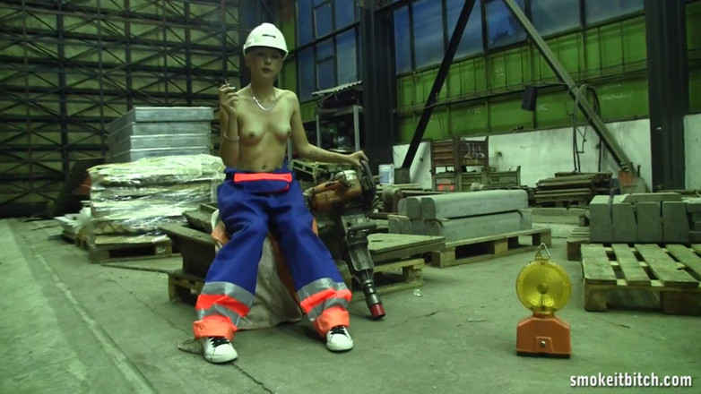 Smoke it bitch: Skinny blonde worker in the factory takes her break for...