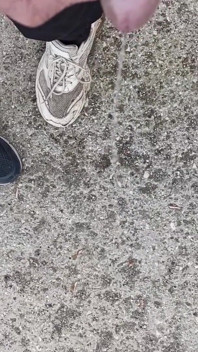 Friend Is Holding My Cock While Im Peeing on the Ground Outdoor