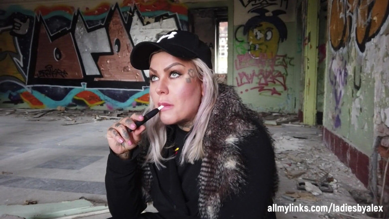 Fetish videos by Alex: Blonde Lady Smokes an Electronic Cigarette on Stair