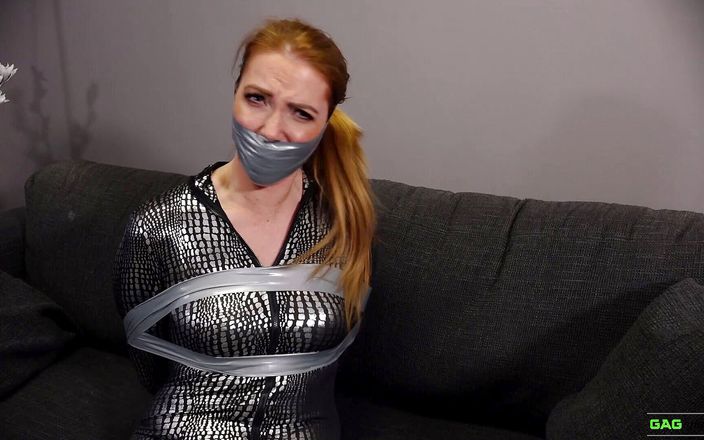 Gag Attack!: Mila - roodharige catsuit crook in tape bondage