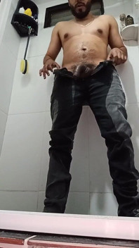 Urinating in Dark Jeans