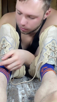 A Man Caresses the Legs of a Cute Twink